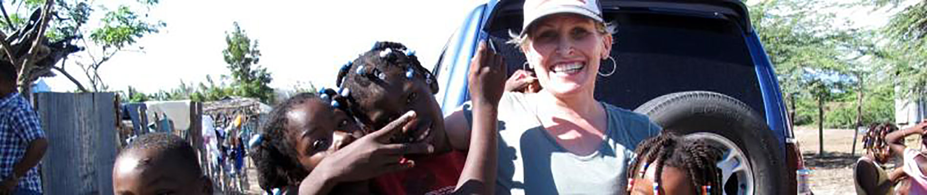 Nurse with children in Haiti